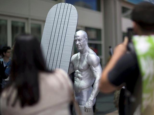 A man cosplaying Silver Surfer from Fantastic Four comic series at the San Diego Comic Con. (Reuters Photo)