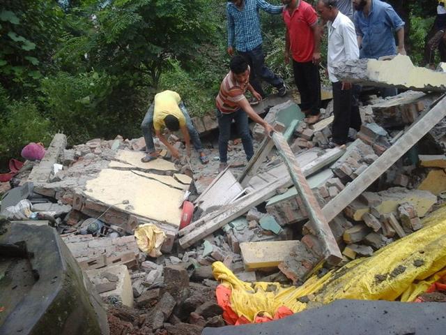 A house collapsed in Doda area of Jammu and Kashmr following incessant rains on Sunday. HT Photo