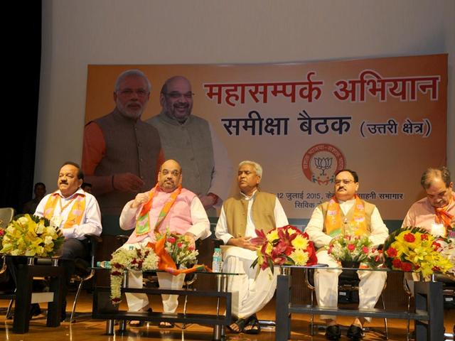 BJP President Amit Shah with Dr Harsh Vardhan and other BJP senior leaders during the 'Mahasampark Abhiyan' workshop at Civic Centre in New Delhi. (Photo by Sushil Kumar/HT Photo)