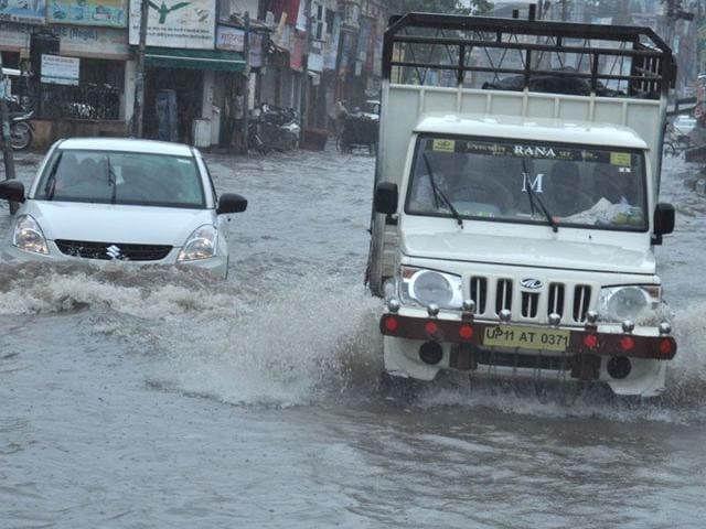 Rains inundate low-lying area around Committee Chowk and other areas in Karnal on Sunday.HT Photo