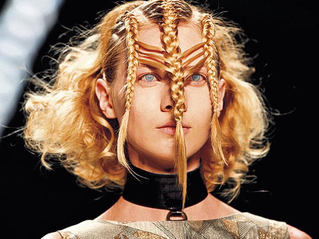 You can step up your braid game with this triple braided, wavy hairstyle by Irene Luft at the Berlin Fashion Week. 