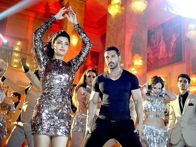 John Abraham and Shruti Haasan show us what makes a Bollywood song. The stars are on the sets of Welcome Back. (AFP photo)