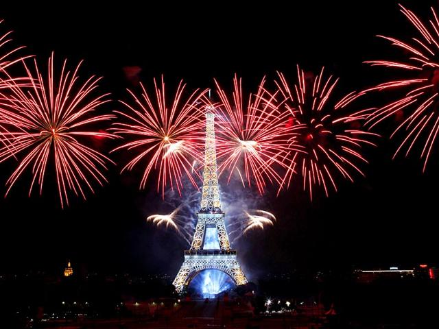 Fireworks illuminate the Eiffel Tower in Paris during Bastille Day celebrations. Bastille Day marks the July 14, 1789, storming of the Bastille prison by angry Paris crowds that helped spark the French Revolution. (AP Photo) Fireworks illuminate the Eiffel Tower in Paris during Bastille Day celebrations. Bastille Day marks the July 14, 1789, storming of the Bastille prison by angry Paris crowds that helped spark the French Revolution. (AP Photo)