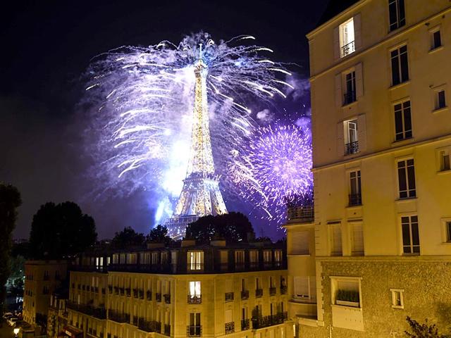 Fireworks light the skies above the Eiffel Tower in the French capital Paris, as part of France's annual Bastille Day celebrations. (AFP Photo) Fireworks light the skies above the Eiffel Tower in the French capital Paris, as part of France's annual Bastille Day celebrations. (AFP Photo)