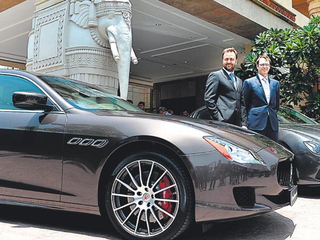 Maserati’s network development manager Bojan Jankulovski (right) at the re-launch of the brand in New Delhi on Wednesday. (AFP Photo)