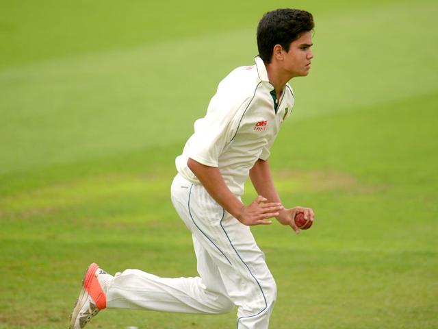 Arjun running in to bowl. (Reuters Photo)