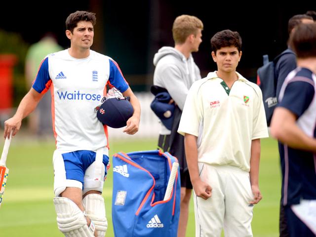 Arjun with England Test captain Alastair Cook. (Reuters Photo)