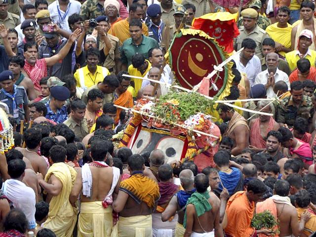 Lord Jagannath during Dhadi Pahandi - the procession from temple to the chariots - at the grand road (Bada Danda) during Nabakalebar Rathayatra Festival in Puri, Odisha, on Saturday. (Arabinda Mahapatra/ HT Photo)