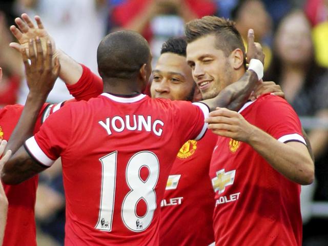 Manchester United's Morgan Schneiderlin, right, celebrates scoring a goal against Club America in United's pre-season friendly match at CenturyLink Field, Seattle, on July 17, 2015. (Reuters Photo) Manchester United's Morgan Schneiderlin, right, celebrates scoring a goal against Club America in United's pre-season friendly match at CenturyLink Field, Seattle, on July 17, 2015. (Reuters Photo)