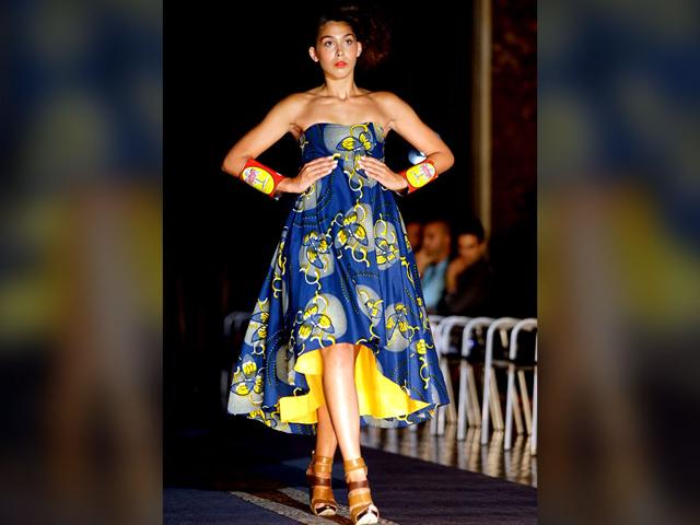 A model shows off a creation from African fashion studio AAA during the MODAAFRICA, African fashion week. Lisbon's AAA studio is a project that promotes the fashion work of immigrants from different African countries. (AP Photo/Armando Franca) A model shows off a creation from African fashion studio AAA during the MODAAFRICA, African fashion week. Lisbon's AAA studio is a project that promotes the fashion work of immigrants from different African countries. (AP Photo/Armando Franca)