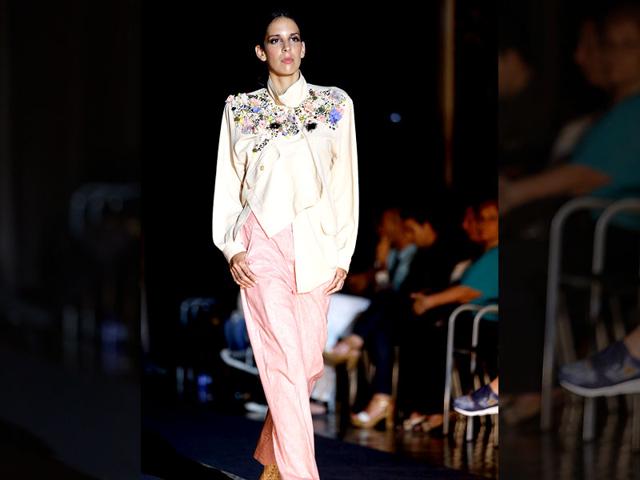 A model displays a creation by Moroccan designer Ghitta Laskrouif during the MODAAFRICA, African fashion week. (AP Photo/Armando Franca) A model displays a creation by Moroccan designer Ghitta Laskrouif during the MODAAFRICA, African fashion week. (AP Photo/Armando Franca)
