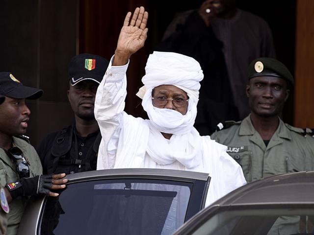 A file picture of former Chadian dictator Hissene Habre gesturing as he leaves a Dakar courthouse after an identity hearing on June 3, 2015. (AFP Photo)