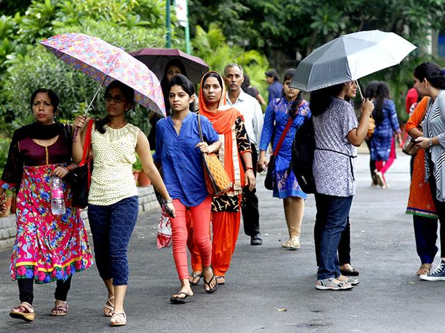Students arrive on the first day of college in north campus in New Delhi, India. (HT Photo/Arun Sharma)