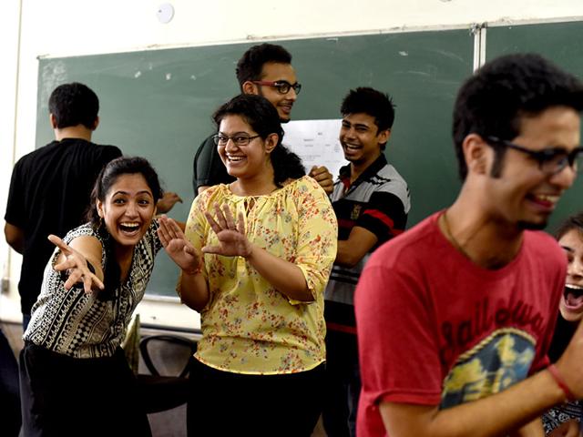 Students interact on the first day of college at Venkateshwar College in South Campus. Delhi University's new session commenced in all the affiliated colleges in New Delhi, India. (HT Photo/Saumya Khandelwal)