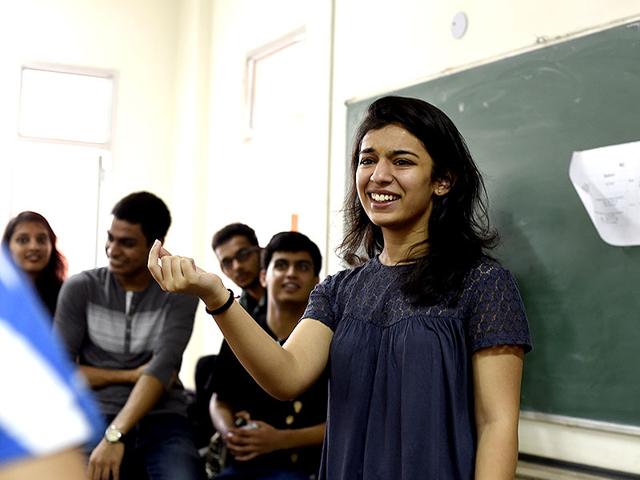 Students interact on the first day of college at Venkateshwar College in South Campus. Delhi University's new session commenced in all the affiliated colleges in New Delhi, India. (HT Photo/Saumya Khandelwal)