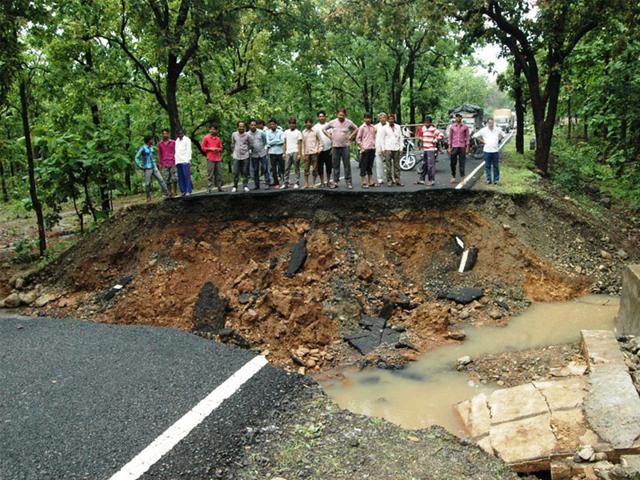 In Begamganj tehsil of Raisen district, about a dozen villages remained cut off as local rivulet Semri was on spate on Saturday following heavy rains. (HT)