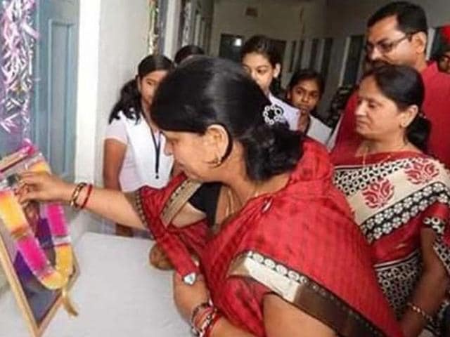 A photograph of the Jharkhand education minister apparently paying floral tribute to former president APJ Abdul Kalam, who is still alive, has gone viral on social media and given rise to a range of controversies. (Photo posted on Twitter by Lubna Khan) A photograph of the Jharkhand education minister apparently paying floral tribute to former president APJ Abdul Kalam, who is still alive, has gone viral on social media and given rise to a range of controversies. (Photo posted on Twitter by Lubna Khan)