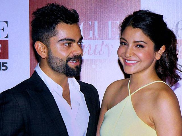 Virat Kohli and Anushka Sharma made quite a pair at a recent fashion event in Mumbai. Not hiding from camera any more, the power couple was happy to pose for shutterbugs. (PTI photo)