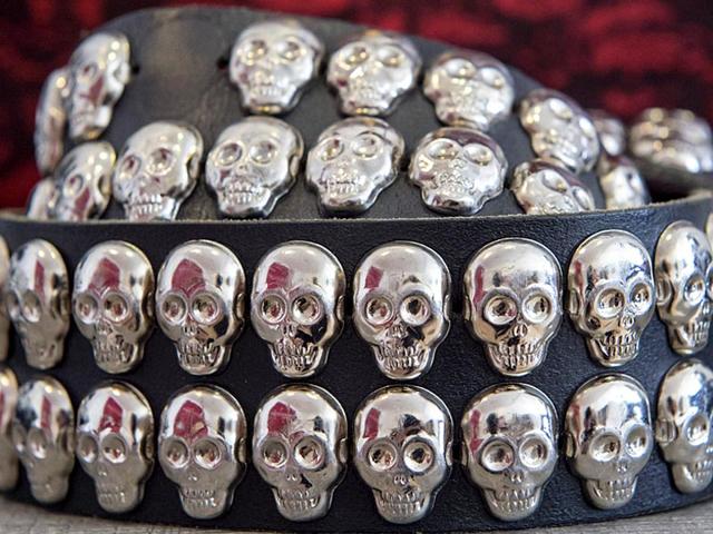 A belt with skull motives arranged at the exhibition Buy now, die later! in Kassel, Germany. (AP Photo/Jens Meyer) A belt with skull motives arranged at the exhibition Buy now, die later! in Kassel, Germany. (AP Photo/Jens Meyer)