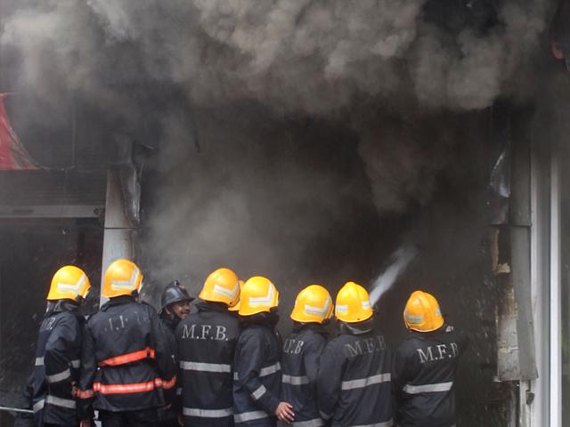 A major fire erupted in a shop at Bandra west, Linking Road in Mumbai. The blaze started after leather and plastic items caught fire and the flames spread quickly. (Satish Bate/HT photo)