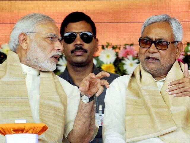 Prime Minister Narendra Modi with Bihar chief minister Nitish Kumar at a function for the launch of a number of government schemes in Patna on Saturday. (PTI Photo) Prime Minister Narendra Modi with Bihar chief minister Nitish Kumar at a function for the launch of a number of government schemes in Patna on Saturday. (PTI Photo)
