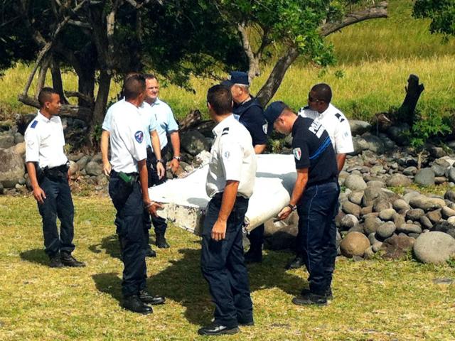 This-picture-taken-on-August-2-2015-shows-metallic-debris-found-on-a-beach-in-Saint-Denis-on-the-French-Reunion-Island-in-the-Indian-Ocean-close-to-where-where-a-Boeing-777-wing-part-believed-to-belong-to-missing-flight-MH370-washed-up-AFP-Photo