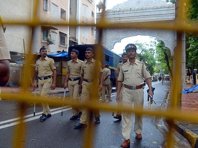 A-couple-walks-past-a-road-leading-to-the-residence-of-Yakub-Memon-in-Mumbai-on-Thursday-Yakub-Memon-was-hanged-at-a-Nagpur-jail-on-Thursday-for-his-role-in-a-series-of-co-ordinated-attacks-that-killed-hundreds-of-people-in-Mumbai-in-1993-AFP-Photo