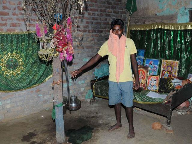 Son of witchcraft performer Sukkho in the woman’s ‘prayer room’ at Kamboh village in Tarn Taran district.