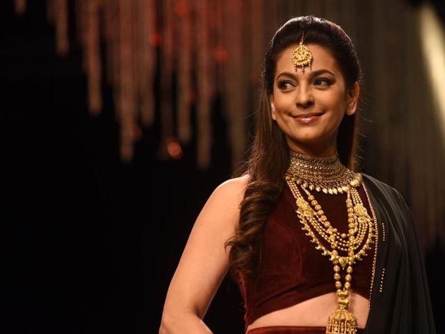 Indian Bollywood film actress Juhi Chwla showcases a creation during India International Jewellery Week 2015 in Mumbai on August 3, 2015. AFP PHOTO (AFP)