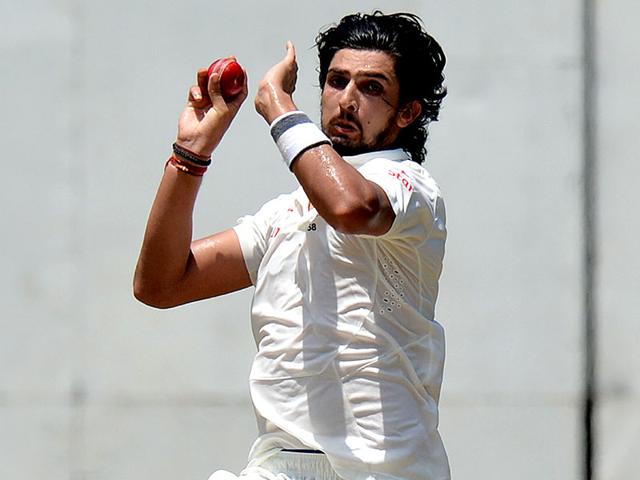 Sri Lankan bowler Dhammika Prasad and India's Ishant Sharma exchange words on day four of the third Test match in Colombo. (AP Photo)