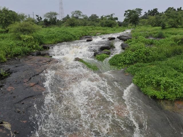 Incessant rains created a rivulet at Shyamla Hills in Bhopal on Tuesday. (HT photo)