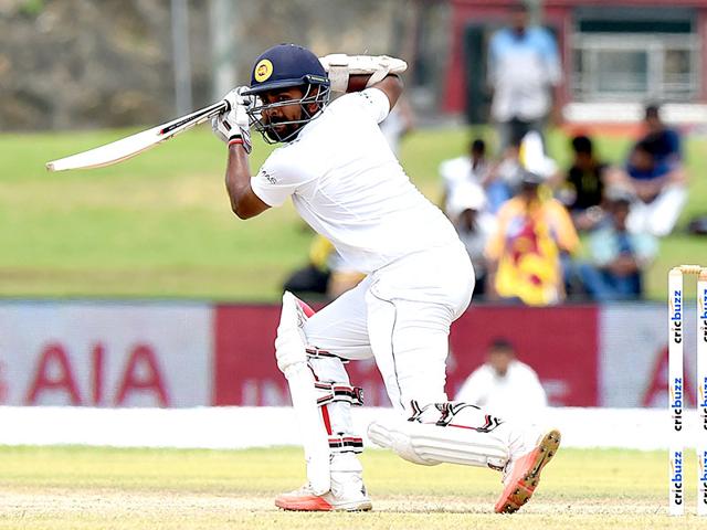 Sri Lanka's Lahiru Thirimanne plays a shot during the first innings. (AFP Photo)