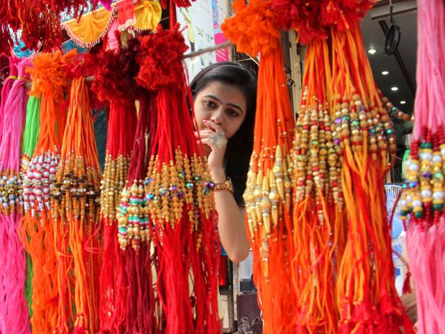A girl buying rakhis ahead of Raksha Bandhan, in Mumbai. (Pramod Thakur/HT photo)