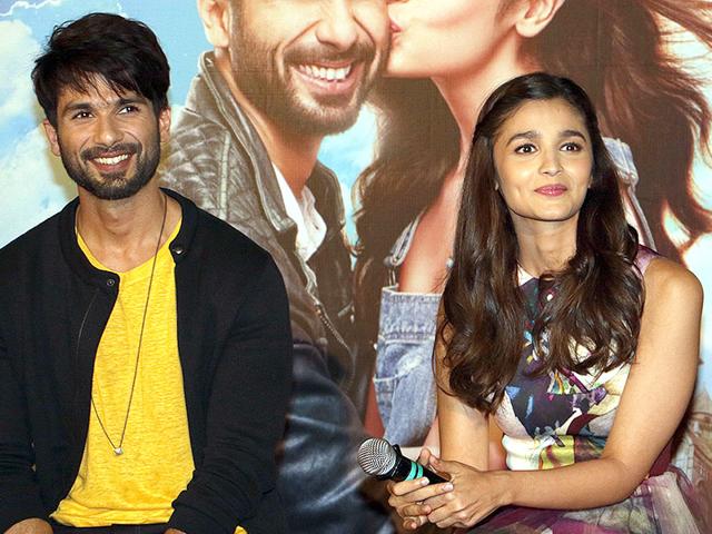 Shahid Kapoor and Alia Bhatt pose for a photograph during a promotional event for Shaandaar. (AFP Photo)