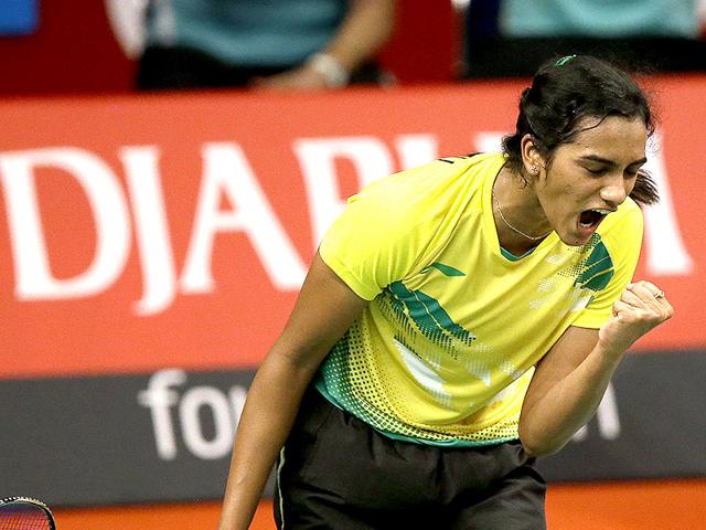India's PV Sindhu celebrates winning a point against China's Li Xuerui during their women's singles match at the BWF World Badminton Championships in Jakarta, Indonesia, on August 13, 2015. (AP Photo)