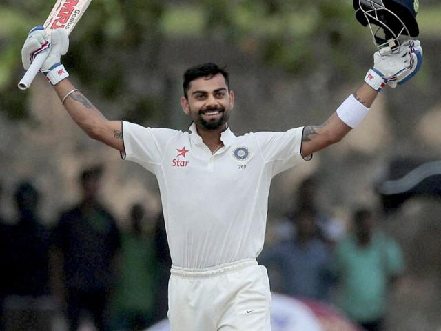 India's Virat Kohli celebrates scoring a century during the second day of their first test cricket match against Sri Lanka in Galle, Sri Lanka. AP/PTI