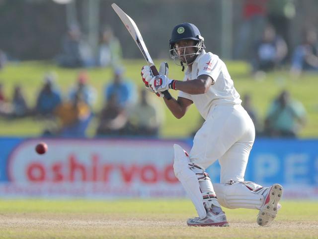India's Wriddhiman Saha plays a shot during the second day of the first test cricket match between Sri Lanka and India in Galle, Sri Lanka. (AP Photo/Eranga Jayawardena)
