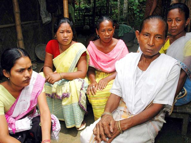 Birubala Rabha (in white dress) has been crusading against witch-hunting after a village quack almost killed her son in 1996. (Subhamoy Bhattacharjee/HT Photo) Birubala Rabha (in white dress) has been crusading against witch-hunting after a village quack almost killed her son in 1996. (Subhamoy Bhattacharjee/HT Photo)