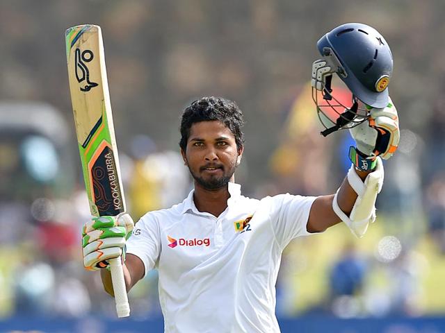 Sri Lanka's Dinesh Chandimal celebrates scoring his century on Day 3 of the first Test match against India at the Galle International Cricket Stadium, in Galle, Sri Lanka, on August 14, 2015. (AFP Photo) Sri Lanka's Dinesh Chandimal celebrates scoring his century on Day 3 of the first Test match against India at the Galle International Cricket Stadium, in Galle, Sri Lanka, on August 14, 2015. (AFP Photo)
