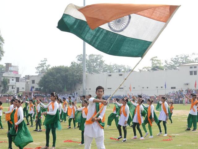 Prime Minister Narendra Modi is greeted as he walks among schoolchildren after delivering his Independence Day speech from the Red Fort in New Delhi. (AFP Photo)