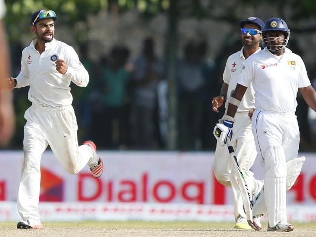 India's Test captain Virat Kohli, left, and Ajinkya Rahane, centre, celebrate the dismissal of Sri Lanka's Rangana Herath on Day 3 of of the first Test in Galle, on August 14, 2015. (Reuters Photo) India's Test captain Virat Kohli, left, and Ajinkya Rahane, centre, celebrate the dismissal of Sri Lanka's Rangana Herath on Day 3 of of the first Test in Galle, on August 14, 2015. (Reuters Photo)