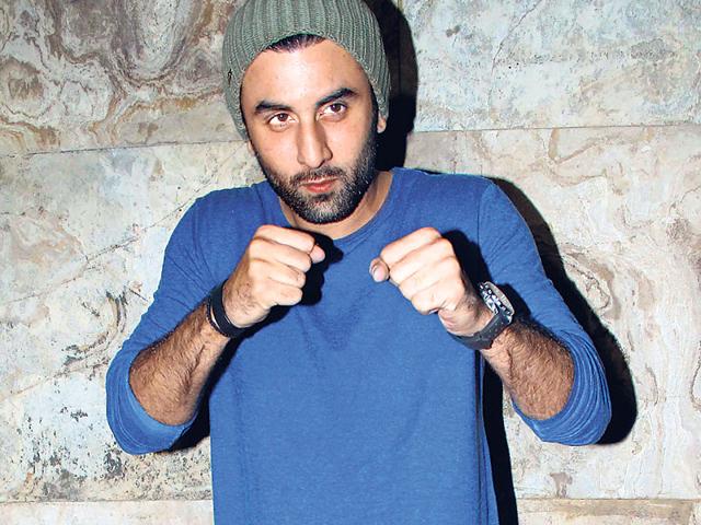 Ranbir Kapoor in a fighter mode? He's only posing for shutterbugs as he arrives with rumoured girlfriend Katrina Kaif for the special screening of Brothers.(Photo: Yogen Shah)