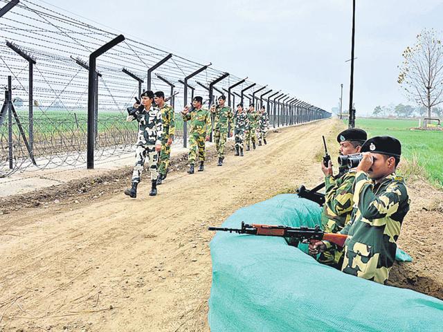 BSF jawans continue their vigil along the Indo-Pakistan international border in Amritsar, which has already witnessed many infiltration attempts this year. (Sameer Sehgal/HT File photo) BSF jawans continue their vigil along the Indo-Pakistan international border in Amritsar, which has already witnessed many infiltration attempts this year. (Sameer Sehgal/HT File photo)