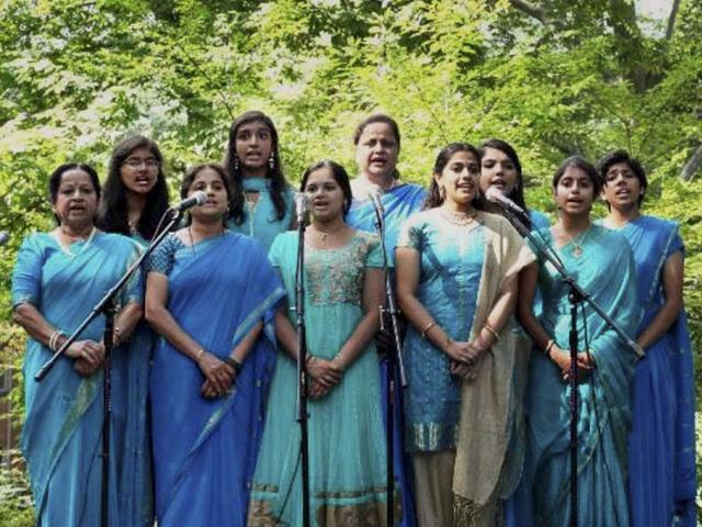 Artists of 'Nadakokila' Choral Group singing patriotic songs during the celebration of India's 69th Independence Day at Embassy Residence in Washington, USA on Saturday. (PTI Photo)