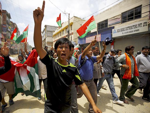 Protesters chant slogans as they march on a road during a general strike organised by a 30-party alliance led by a hardline faction of former Maoist rebels, who are protesting against the draft of the new constitution, in Kathmandu. (Reuters Photo) Protesters chant slogans as they march on a road during a general strike organised by a 30-party alliance led by a hardline faction of former Maoist rebels, who are protesting against the draft of the new constitution, in Kathmandu. (Reuters Photo)