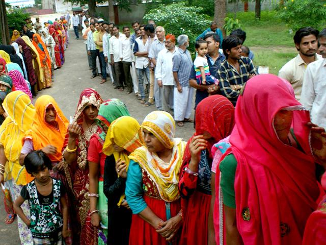 Voters waiting for their turn to exercise their franchise in the municipal corporation election at a poll booth in Jaipur's Chomu area. (HT Photo) Voters waiting for their turn to exercise their franchise in the municipal corporation election at a poll booth in Jaipur's Chomu area. (HT Photo)