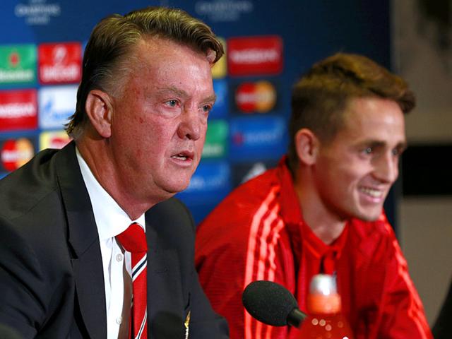 Manchester United manager Louis van Gaal and Belgian player Adnan Januzaj during a press conference ahead of United's Champions League play-off round match against Belgian side Club Brugge at Old Trafford on August 18, 2015. (Reuters Photo) Manchester United manager Louis van Gaal and Belgian player Adnan Januzaj during a press conference ahead of United's Champions League play-off round match against Belgian side Club Brugge at Old Trafford on August 18, 2015. (Reuters Photo)