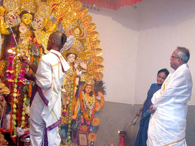 President Pranab Mukherjee during Durga Puja at his ancestral home in Bolpur, West Bengal. (HT Photo) President Pranab Mukherjee during Durga Puja at his ancestral home in Bolpur, West Bengal. (HT Photo)