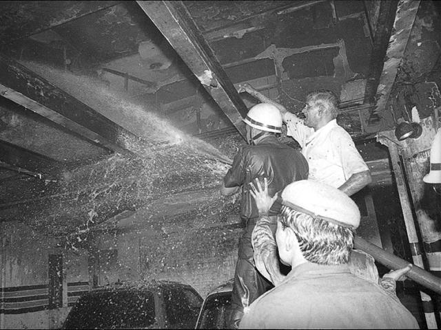 Firefighters trying to douse fire that broke out at the Uphaar Cinema on June 13, 1997. The fire accident took away 59 lives and over 100 were injured. (HT file photo/Prakash Singh)