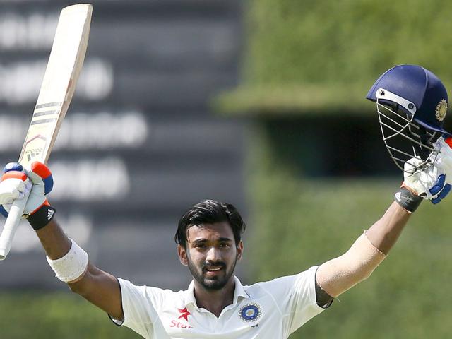 Rahul raises his bat in celebration after scoring his century. (Reuters Photo)
